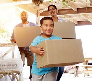 family with moving boxes