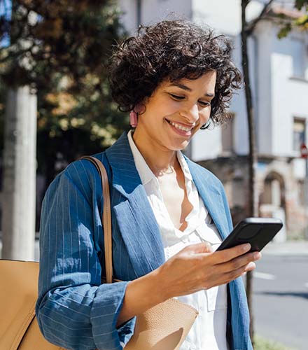 woman outdoor with mobile phone